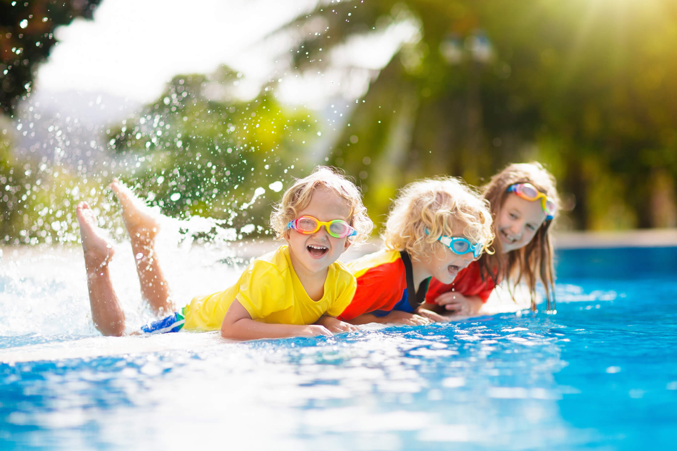 Kids splashing in pool