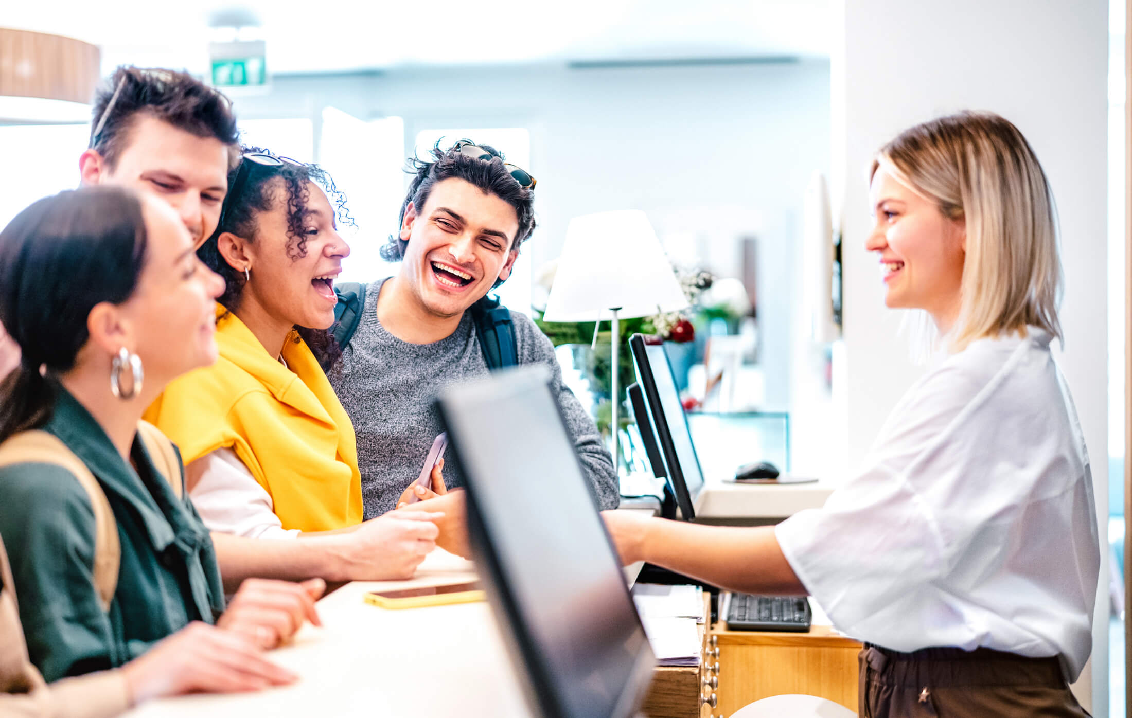 Friends at lobby counter checking in